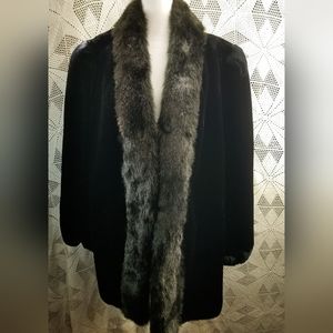 Jordache fur jacket, side pockets, elastic around cuffs,